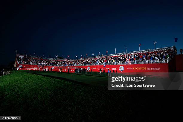Chaska, MN, USA; Fans wait in the grandstands on the first tee as the sun comes up before the Day 2 morning matches for the 2016 Ryder Cup at...