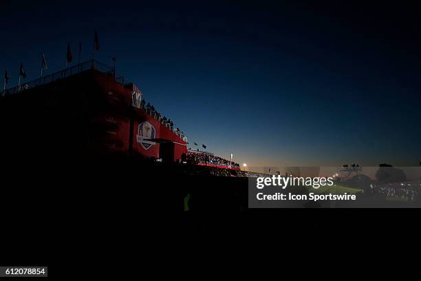 Chaska, MN, USA; Fans wait in the grandstands on the first tee as the sun comes up before the Day 2 morning matches for the 2016 Ryder Cup at...