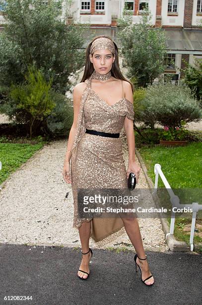 Guest attends the John Galliano show as part of the Paris Fashion Week Womenswear Spring/Summer 2017 on October 2, 2016 in Paris, France.