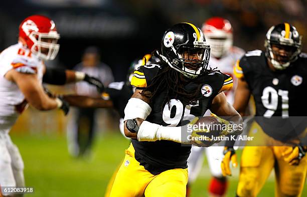 Jarvis Jones of the Pittsburgh Steelers runs up field after intercepting a pass in the first quarter during the game against the Kansas City Chiefs...