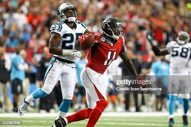 Atlanta Falcons wide receiver Julio Jones celebrates in the end zone during the first half of the NFL game between the Carolina Panthers and the...