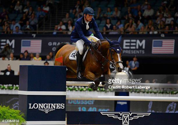 Daniel Deusser of Germany during the Longines Grand Prix event at the Longines Masters of Los Angeles 2016 at the Long Beach Convention Center on...