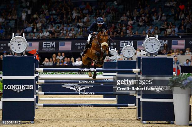 Nayel Nassar of Egypt during the Longines Grand Prix event at the Longines Masters of Los Angeles 2016 at the Long Beach Convention Center on October...
