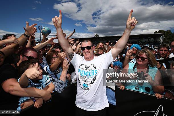 Paul Gallen of the Sharks celebrates with fans during the Cronulla Sharks NRL Grand Final celebrations at Southern Cross Group Stadium on October 3,...