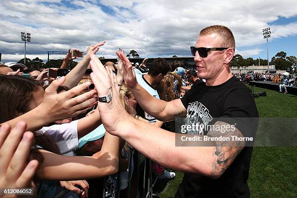 Luke Lewis of the Sharks celebrates with fans during the Cronulla Sharks NRL Grand Final celebrations at Southern Cross Group Stadium on October 3,...