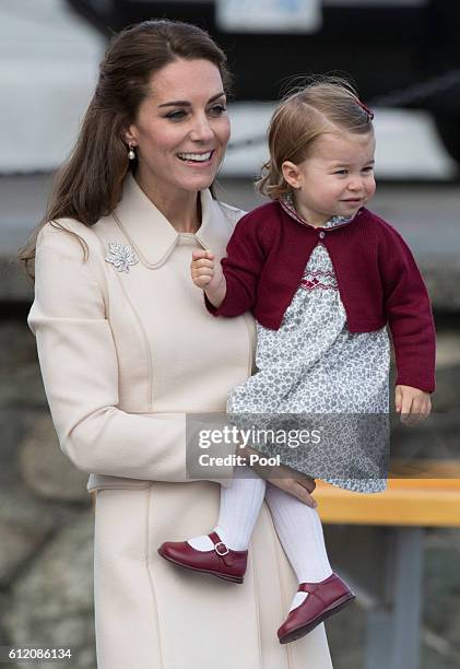 Catherine, Duchess of Cambridge and Princess Charlotte leave from Victoria Harbour to board a sea-plane on the final day of their Royal Tour of...