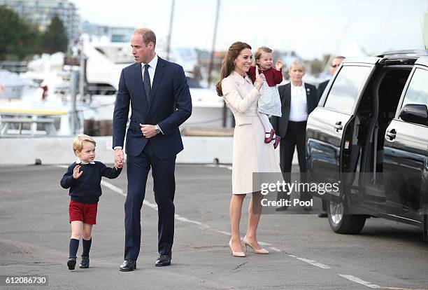 Prince William, Duke of Cambridge, Prince George of Cambridge, Catherine, Duchess of Cambridge and Princess Charlotte leave from Victoria Harbour to...