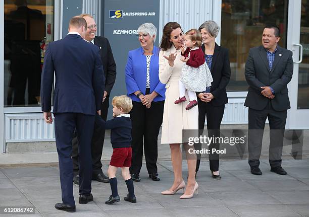 Prince William, Duke of Cambridge, Prince George of Cambridge, Catherine, Duchess of Cambridge and Princess Charlotte leave from Victoria Harbour to...