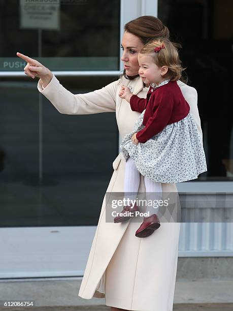 Catherine, Duchess of Cambridge and Princess Charlotte leave from Victoria Harbour to board a sea-plane on the final day of their Royal Tour of...