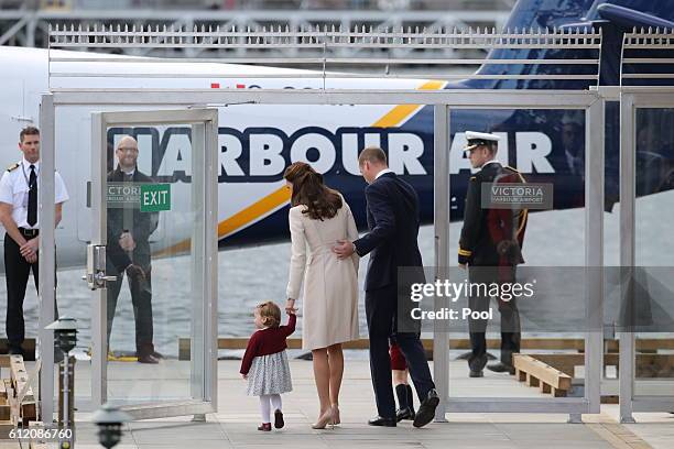 Prince William, Duke of Cambridge, Prince George of Cambridge, Catherine, Duchess of Cambridge and Princess Charlotte leave from Victoria Harbour to...