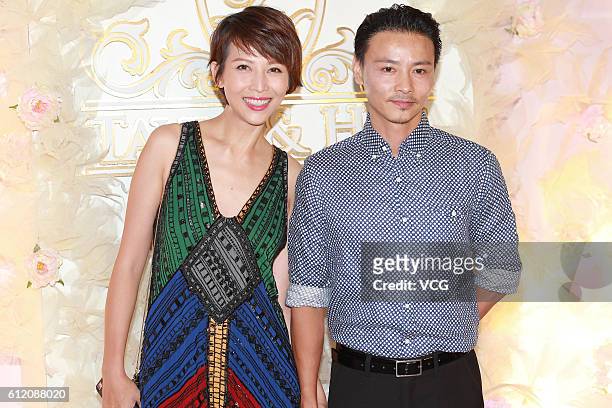 Actor Zhang Jin and wife actress Ada Choi attend actor Him Law and actress Tavia Yeung's wedding ceremony on October 2, 2016 in Hong Kong, China.