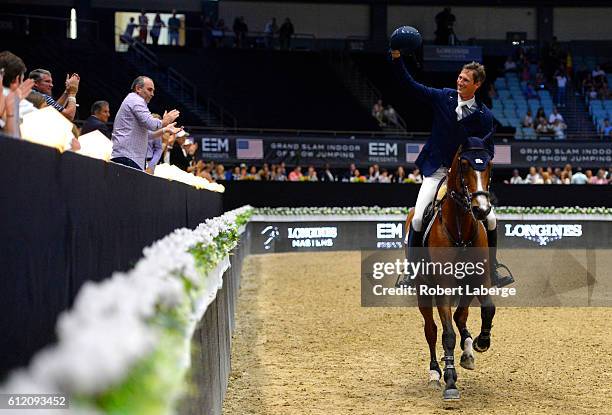 Daniel Deusser of Germany celebrates after winning during the Longines Grand Prix event at the Longines Masters of Los Angeles 2016 at the Long Beach...