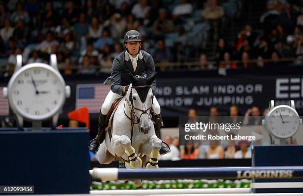 Eduardo Menezes of Brazil competes during the Longines Grand Prix event at the Longines Masters of Los Angeles 2016 at the Long Beach Convention...