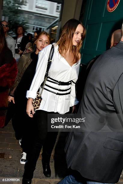 Pauline Ducruet and a guest attend the John Galliano show as part of the Paris Fashion Week Womenswear Spring/Summer 2017 on October 2, 2016 in...