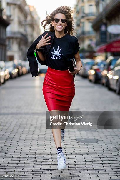 Fashion blogger and model Alexandra Lapp wearing a red pencil skirt from American Retro, Jerzees Addicted tshirt, Chanel bag, Addidas sneacker, H&M...