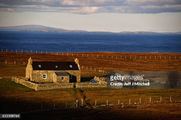 View of a property on the Island of Foula on October 2, 2016 in Foula, Scotland. Foula is the remotest inhabited island in Great Britain with a...