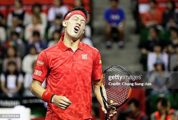Kei Nishikori of Japan reacts during the men's singles first round match against Donald Young of USA on day one of Rakuten Open 2016 at Ariake...