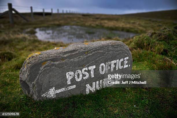 Post mistress Sheila Gear, working in the Island of Foula Post Office on September 30, 2016 in Foula, Scotland. Foula is the remotest inhabited...
