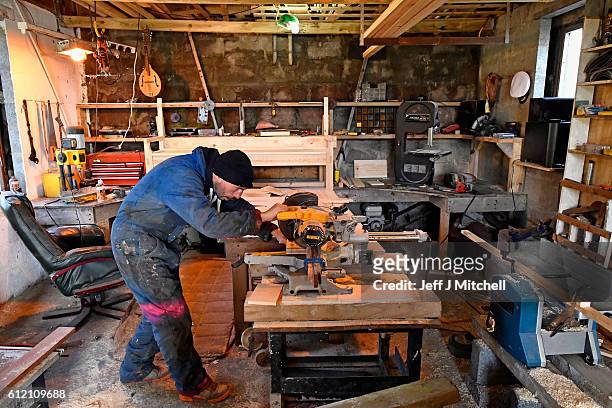 Stuart Taylor works in his wood workshop on the Island of Foula on September 30, 2016 in Foula, Scotland. Foula is the remotest inhabited island in...