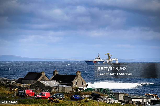 An oil rig supply vessel shelters from bad weather off Ham Voe on the Island of Foula on September 29, 2016 in Foula, Scotland. Foula is the remotest...