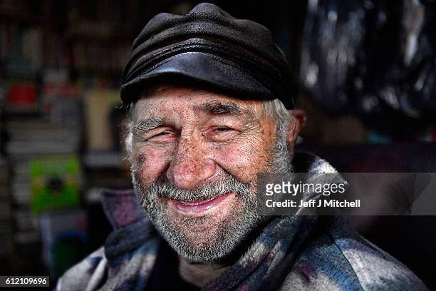 Seventy eight year old crofter Eric Ibister sits in his armchair at his home in Hametoun on the Island of Foula, September 30, 2016 in Foula,...