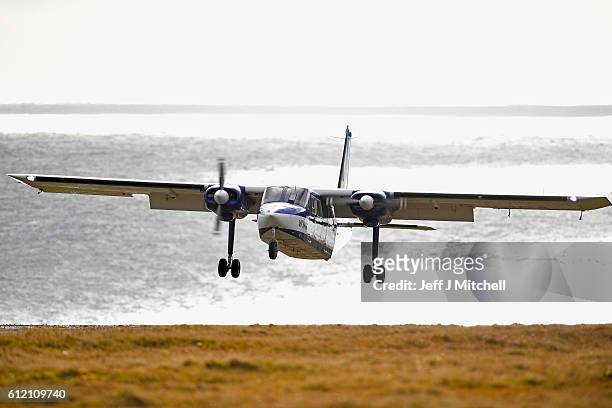 The Islander Aircraft land at the airstrip on the Island of Foula on September 29, 2016 in Foula, Scotland. Foula is the remotest inhabited island in...