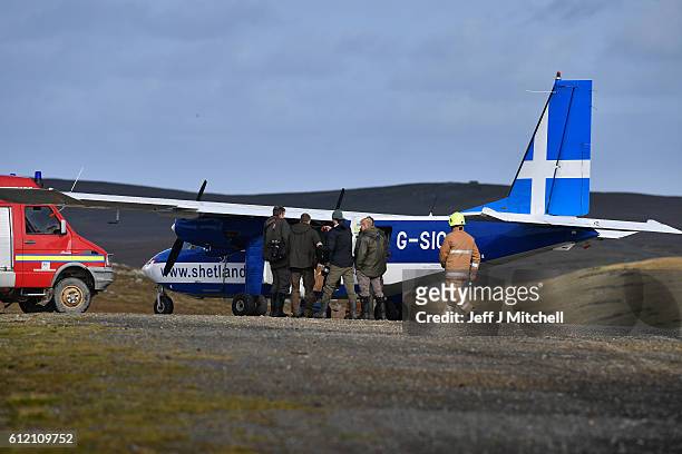 The Islander Aircraft land at the airstrip on the Island of Foula on September 29, 2016 in Foula, Scotland. Foula is the remotest inhabited island in...