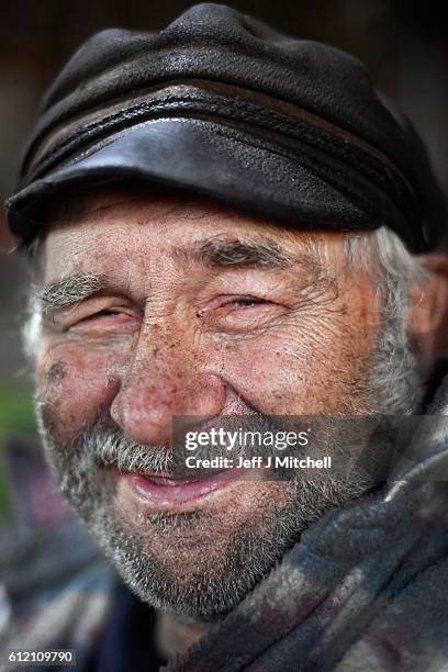 Seventy eight year old crofter Eric Ibister sits in his armchair at his home in Hametoun on the Island of Foula, September 30, 2016 in Foula,...