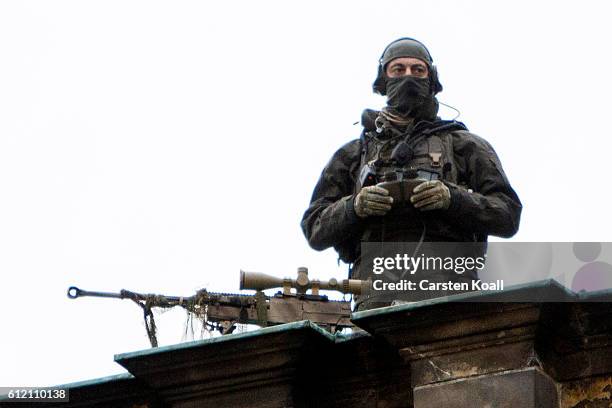 Snipers observe the celebrations to mark German Unity day on October 3, 2016 in Dresden, Germany. Unity Day, called Tag der Deutschen Einheit,...