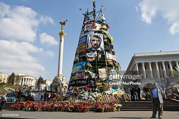 Poster of discharged Ukrainian opposition leader Yulia Tymoshenko installed on a metal base belonging to a destroyed Christmas tree, on the...
