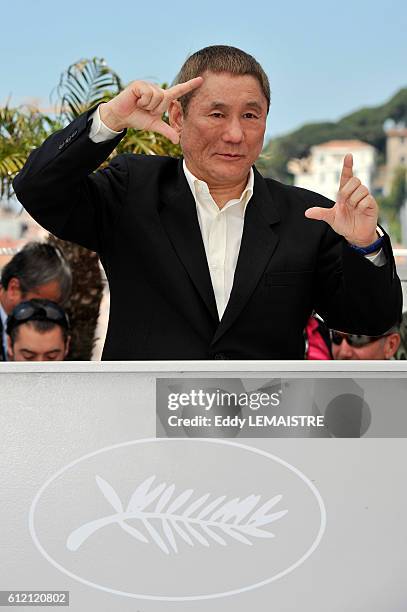 Takeshi Kitano at the photo call for ?Outrage? during the 63rd Cannes International Film Festival.