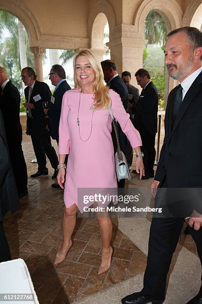 Attorney General Pam Bondi enters the Ballroom. Keynote Speaker Donald Trump with guest Dr. Ben Carson attend the Palm Beach Lincoln Day Dinner at...