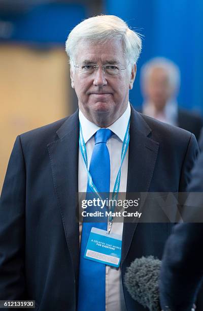 Defence Secretary Sir Michael Fallon arrives on the second day of the Conservative Party Conference 2016 at the ICC Birmingham on October 3, 2016 in...