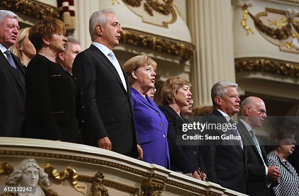 Leading German politicians, including German Chancellor Angela Merkel , Saxony Governor Stanislaw Tillich and President Joachim Gauck attend...