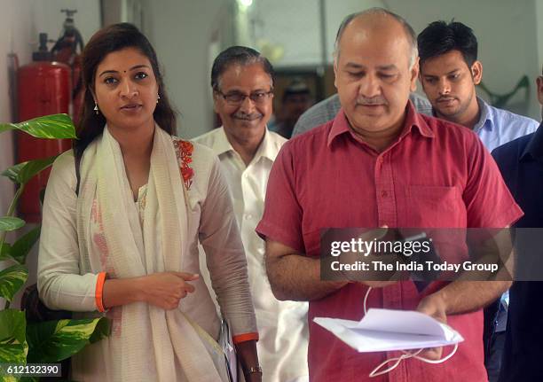 Deputy Chief Minister of Delhi Manish Sisodia with Alka Lamba during One day special session of vidhan sabha in New Delhi.