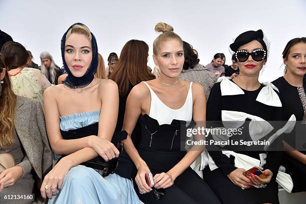 Ulyana Sergeenko, Elena Perminova and a guest attend the Giambattista Valli show as part of the Paris Fashion Week Womenswear Spring/Summer 2017 on...