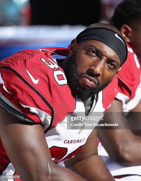 Stepfan Taylor of the Arizona Cardinals looks on from the bench during NFL game action against the Buffalo Bills at New Era Field on September 25,...
