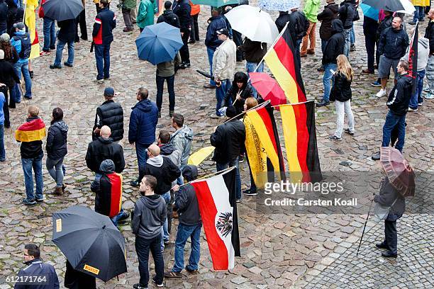 People attend a ralley of right wing citizens movement "Festung Europa" on German Unity Day on October 3, 2016 in Dresden, Germany. Unity Day, called...