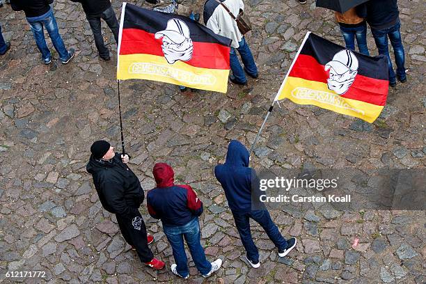 People attend a ralley of right wing citizens movement "Festung Europa" on German Unity Day on October 3, 2016 in Dresden, Germany. Unity Day, called...