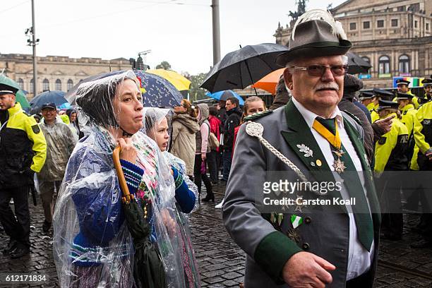 People wearing traditional dresses during the celebrations to mark German Unity day on October 3, 2016 in Dresden, Germany. Unity Day, called Tag der...