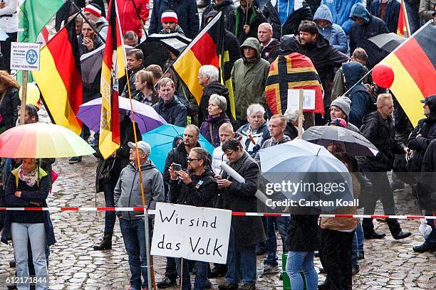 People attend a ralley of right wing citizens movement "Festung Europa" on German Unity Day on October 3, 2016 in Dresden, Germany. Unity Day, called...