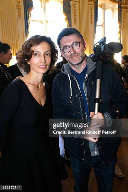 French Minister of Culture and Communication, Audrey Azoulay and photographer Loic Prigent attend Alber Elbaz receives the Insigna of "Officier de la...