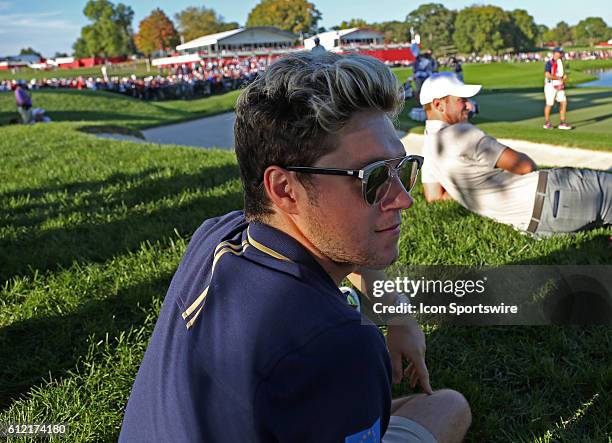 Chaska, MN, USA; One Direction singer Niall Horan watches the matches from near the 17th green during the Day 2 afternoon matches during the 2016...