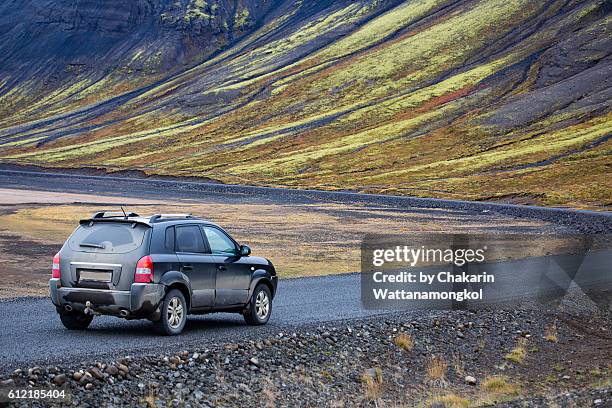 iceland roadside scenery (autumn) - sports utility vehicle stockfoto's en -beelden