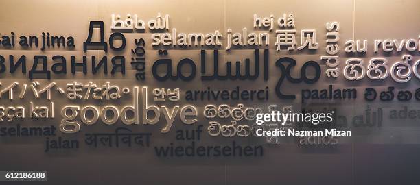 the close up shot on how people around the world say goodbye. - translation stockfoto's en -beelden