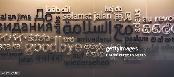 the close up shot on how people around the world say goodbye. - translator stock pictures, royalty-free photos & images