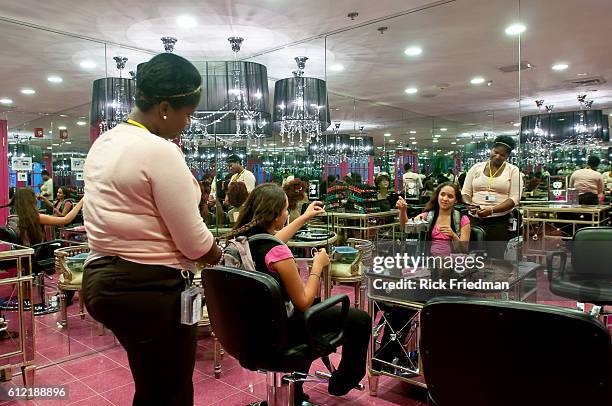 Genesis Ruiz of New York has her hair done by Felisha Alexander, a staff member at Hair salon on Rewards Street inside Judge Rotenberg Center. The...