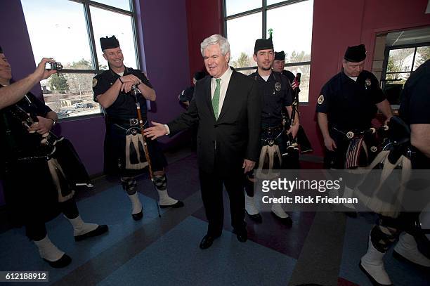 Potential Republican presidential candidate and former Speaker of the US House of Representatives Newt Gingrich listening to the NH Police...