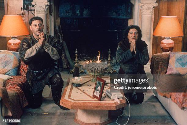 French actors Jean Reno and Christian Clavier in the film "Les Visiteurs", directed by Jean-Marie Poire.