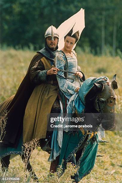 French actors Valerie Lemercier and Jean Reno in the film "Les Visiteurs", directed by Jean-Marie Poire.